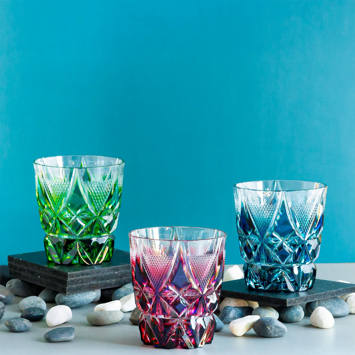 Satsuma Kiriko Two-tone whisky glass, green purple and blue, side view, grey table
