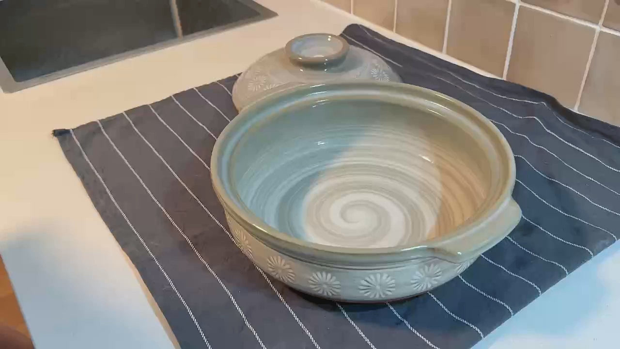 How to season a new donabe: the seven steps, from the first wash to drying it upside down.
